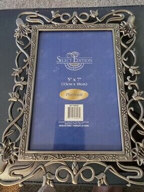 Select 5" x 7" (13cm x 18cm) portrait photo frame, an ornate Scrolled Frame